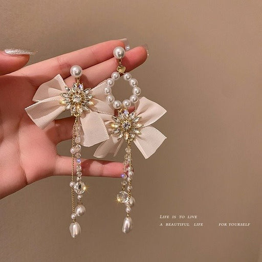 Wholesale pearl crystal white bow earrings JDC-ES-BY-045 Earrings 宝钰 Wholesale Jewelry JoyasDeChina Joyas De China