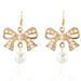 Wholesale pearl golden bow alloy earrings JDC-ES-TC179 Earrings JoyasDeChina golden Wholesale Jewelry JoyasDeChina Joyas De China