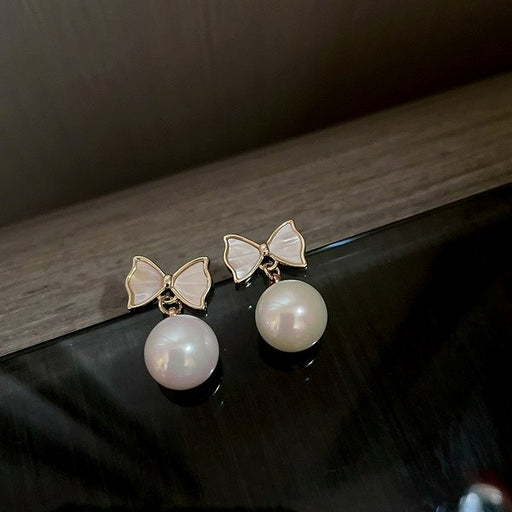 Wholesale pearl shell BOW White Earrings JDC-ES-BY-024 Earrings 宝钰 Wholesale Jewelry JoyasDeChina Joyas De China