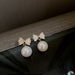Wholesale pearl shell BOW White Earrings JDC-ES-BY-024 Earrings 宝钰 golden Wholesale Jewelry JoyasDeChina Joyas De China