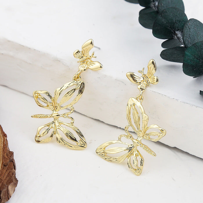 Wholesale pentagram diamond pearl flower butterfly alloy earrings JDC-ES-ManY017 Earrings 满溢 Wholesale Jewelry JoyasDeChina Joyas De China