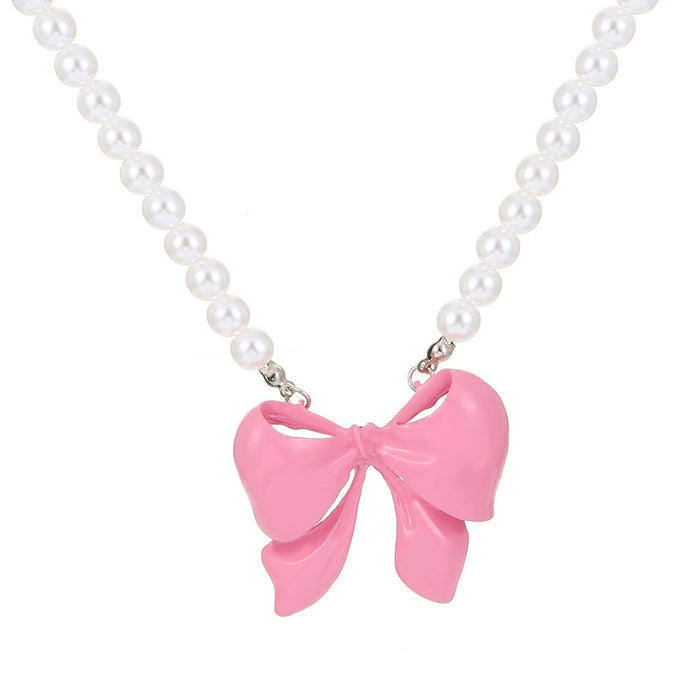 Wholesale Pink Bow Pearl Alloy Necklace JDC-NE-A106 Necklaces 妙雅 02pink9677 Wholesale Jewelry JoyasDeChina Joyas De China