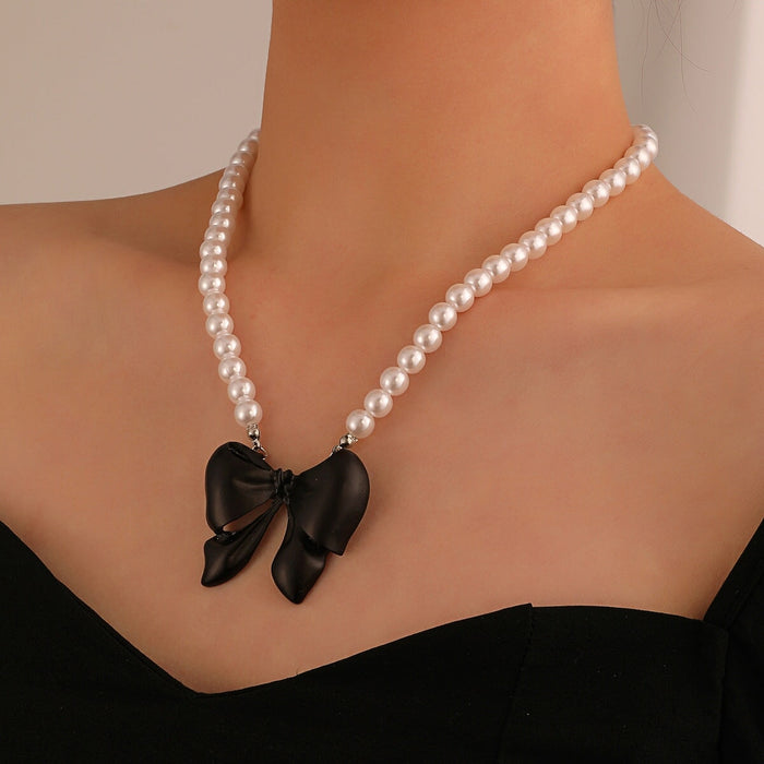 Wholesale Pink Bow Pearl Alloy Necklace JDC-NE-A106 Necklaces 妙雅 Wholesale Jewelry JoyasDeChina Joyas De China