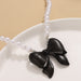 Wholesale Pink Bow Pearl Alloy Necklace JDC-NE-A106 Necklaces 妙雅 Wholesale Jewelry JoyasDeChina Joyas De China