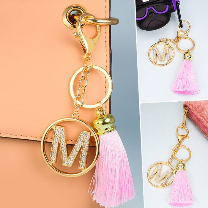 Wholesale pink tassel gold diamond-encrusted letter alloy key chain MOQ≥10 JDC-KC-yongz004 Keychains 永泽 Wholesale Jewelry JoyasDeChina Joyas De China