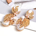 Wholesale Rhinestone Pearl Plated Alloy Earrings JDC-ES-SK025 Earrings 深刻 gold Wholesale Jewelry JoyasDeChina Joyas De China