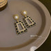 Wholesale silver needle leather pearl alloy earrings JDC-ES-BY165 Earrings 宝钰 Wholesale Jewelry JoyasDeChina Joyas De China