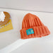 Wholesale solid color label children's wool hat JDC-FH-LH070 FashionHat 旅禾 orange Wholesale Jewelry JoyasDeChina Joyas De China