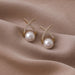 Wholesale X letter pearl cross earrings JDC-ES-W345 Earrings JoyasDeChina The main picture Wholesale Jewelry JoyasDeChina Joyas De China